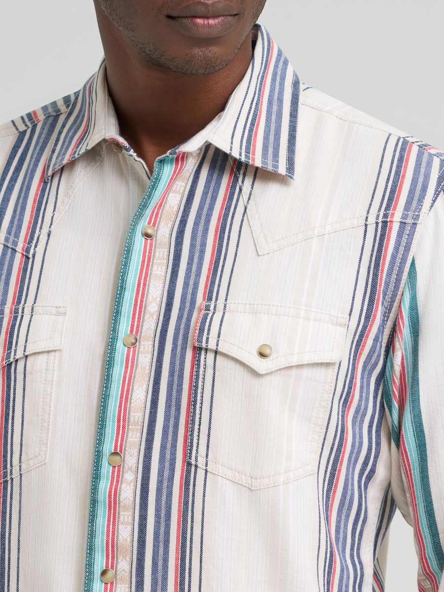 Man wearing a striped shirt Wrangler with a plain background