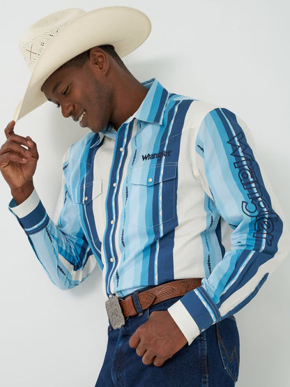 Person wearing a blue and white striped Wrangler shirt with a cowboy hat on a light gray background