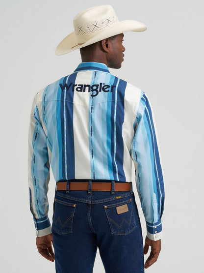 Person wearing a blue and white striped shirt with 'Wrangler' branding, standing against a gray background.