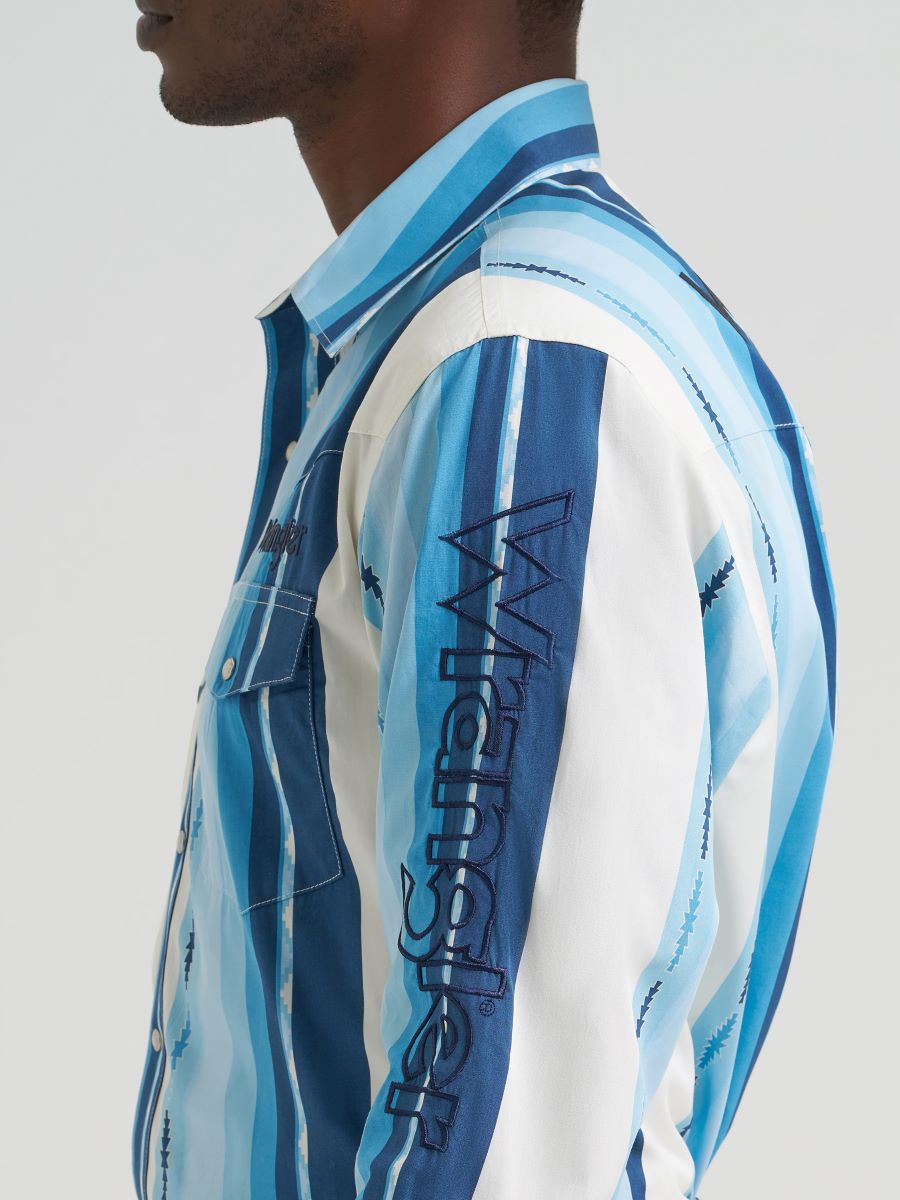 Blue and white striped Wrangler shirt with a brand logo on a gray background