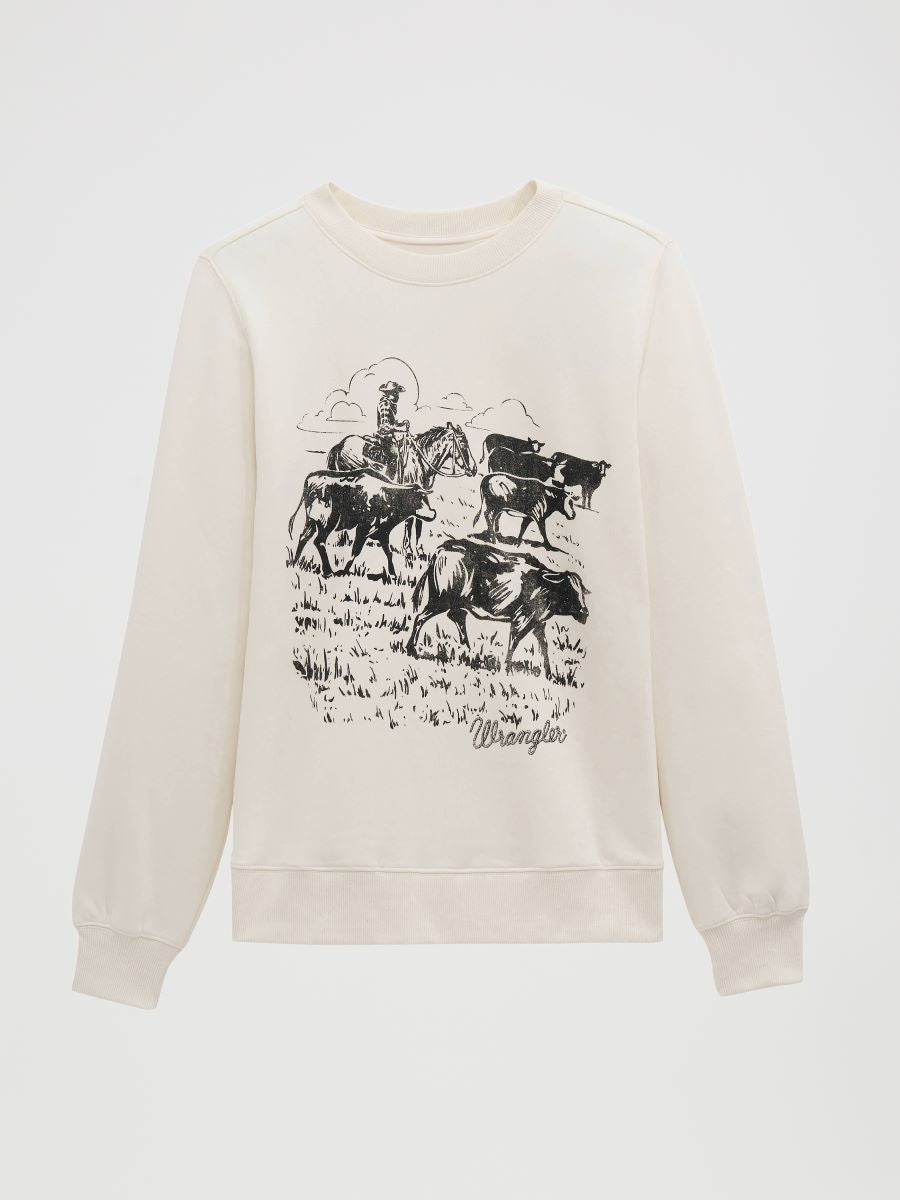 An off-white Wrangler crewneck sweatshirt featuring a black graphic print of a cowboy riding a horse and herding cattle, with the Wrangler logo printed below the illustration.