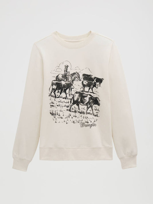 An off-white Wrangler crewneck sweatshirt featuring a black graphic print of a cowboy riding a horse and herding cattle, with the Wrangler logo printed below the illustration.