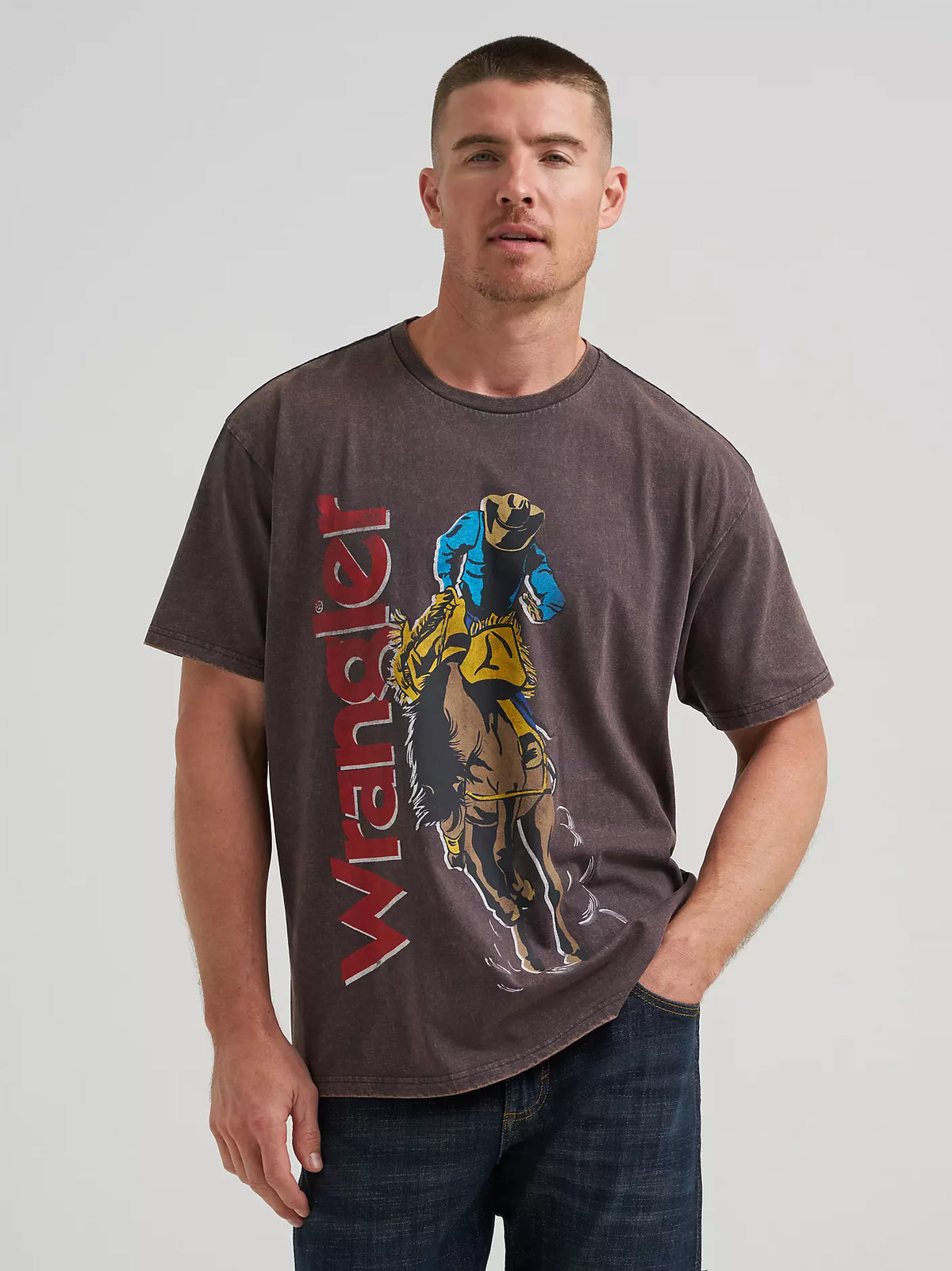 man wearing a Wrangler t shirt with a screen print artwork on front on a white background