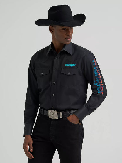 Person wearing a black Wrangler shirt with branding on a gray background