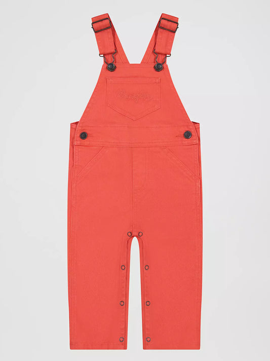 pink Wrangler infant overalls on a light gray background