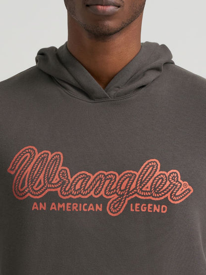 Close up of a Man wearing a grey Wrangler hoodie on a grey background