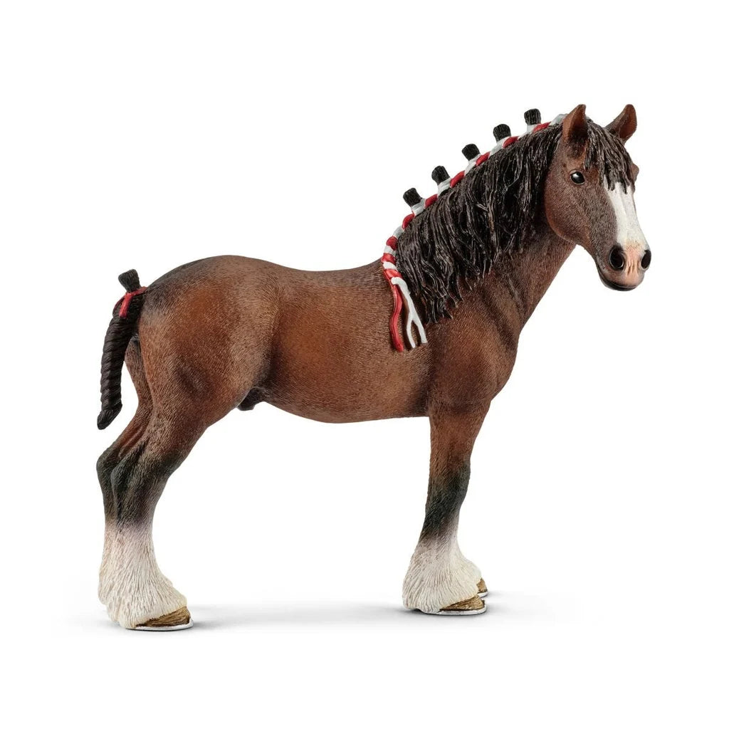 Brown clydesdale gelding figurine by Schleich on a white background