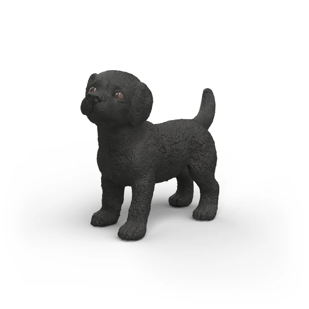Schleich Black dog figurine on a white background
