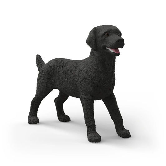 SchleichBlack dog figurine on a white background