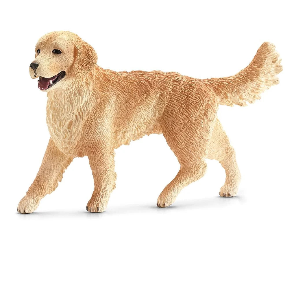 Golden retriever figurine from Schleich on a white background