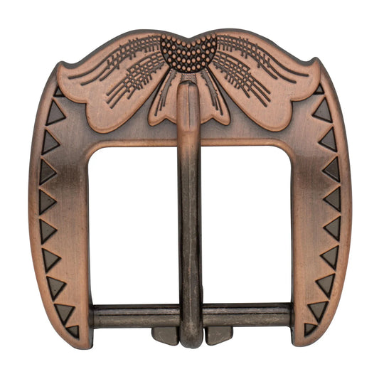 Bronze-colored belt buckle with butterfly or floral design on a white background