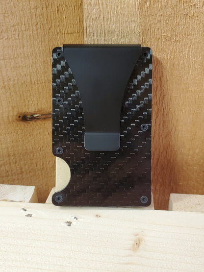 Reverse side of a utility wallet on a wooden background
