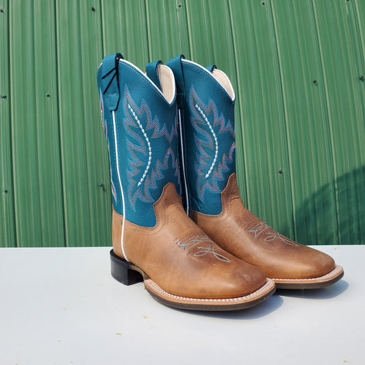 A pair of children's boots with a teal upper and tan leather foot, featuring a rubberized outsole and horseman heel.