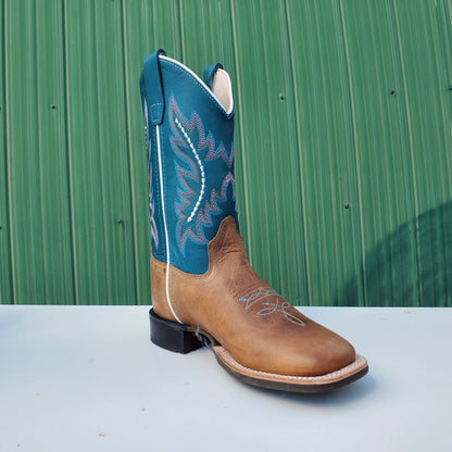 a kids boot with a teal upper and tan leather foot, featuring a rubberized outsole and horseman heel.