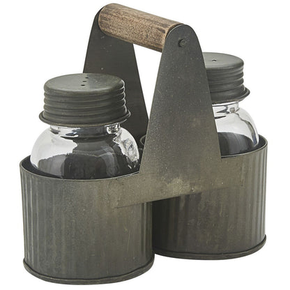 Park Designs salt and pepper shakers in a metal caddy on a white background