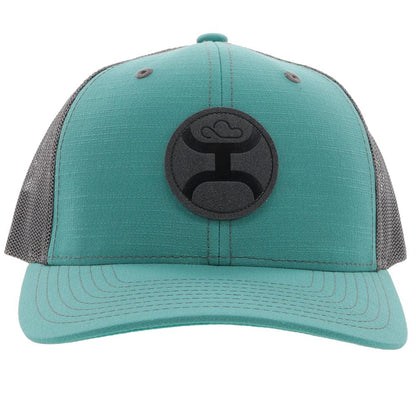 teal and grey cap by hooey on a white background
