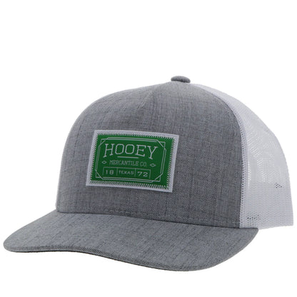 a chambray grey and white cap by hooey with a green patch