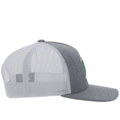 a chambray grey and white cap by hooey with a green patch