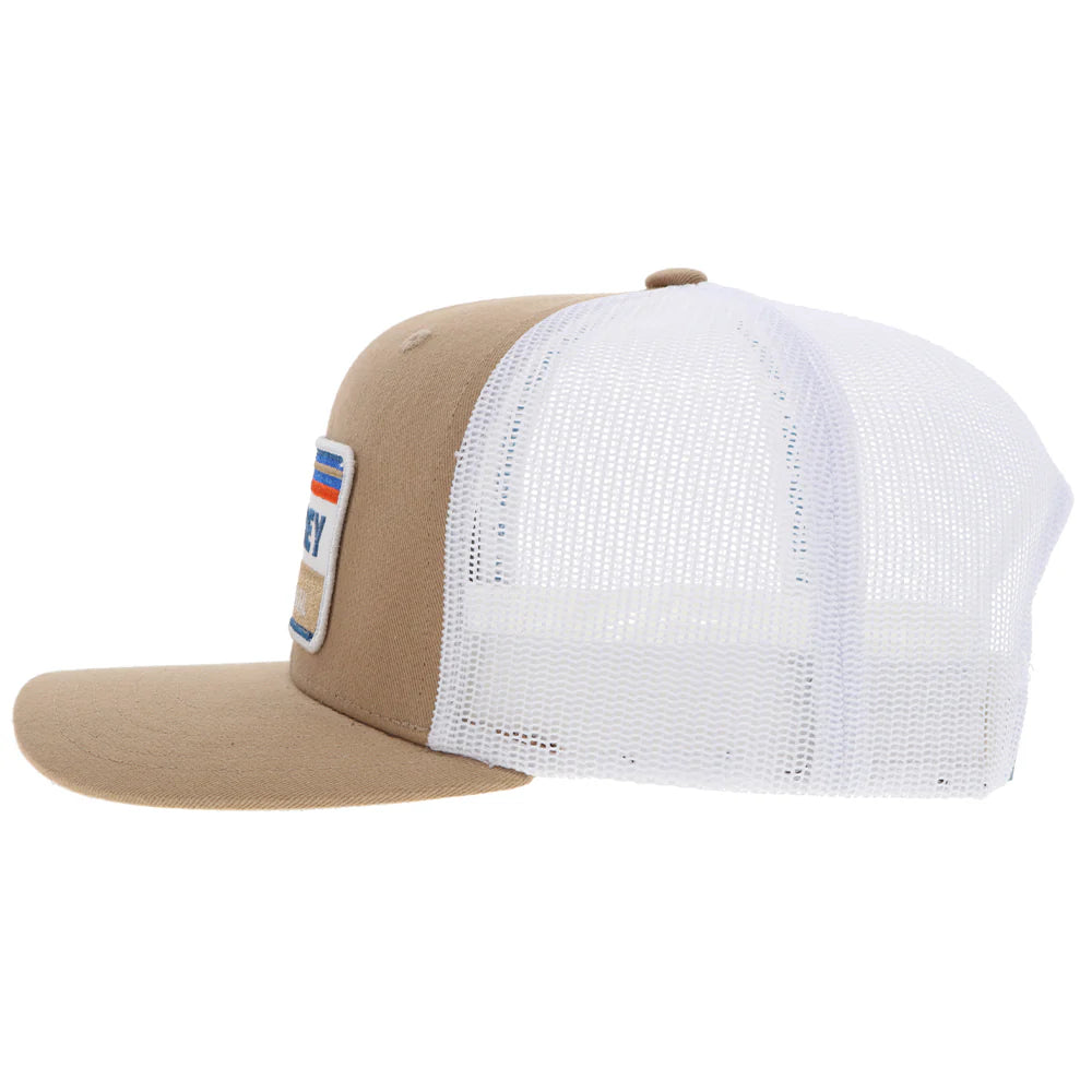 tan and white baseball cap by hooey on a white background
