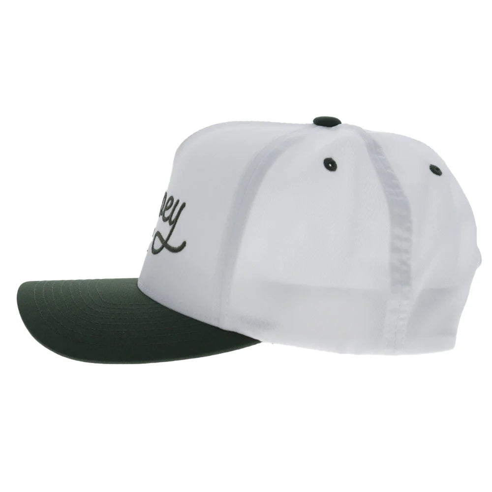 a white and green cap by hooey on a white background