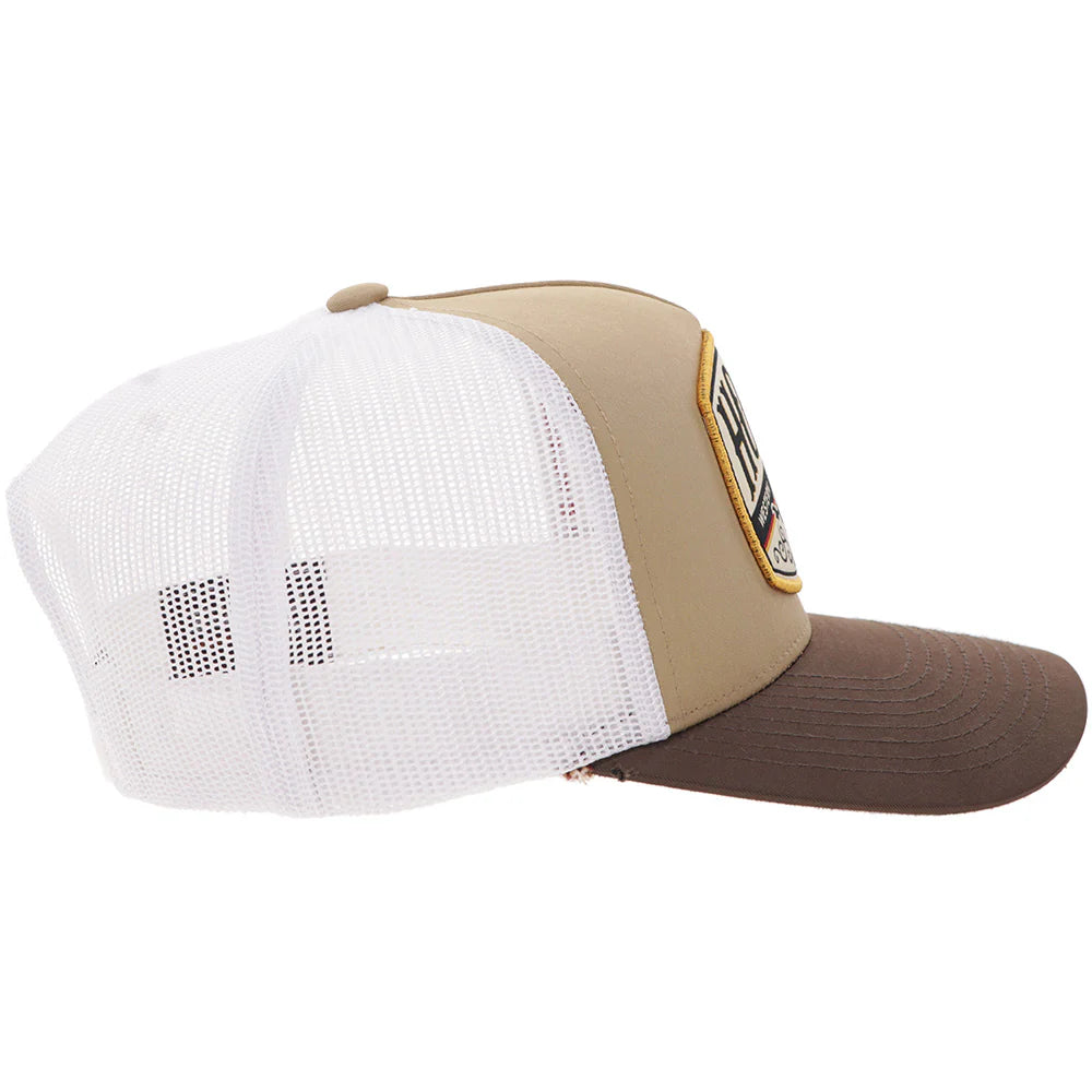 a tan, brown and white hat with a patch that says 'hooey-western original' on a white background
