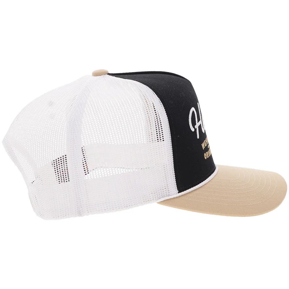 a black, tan and white cap by hooey on a white background