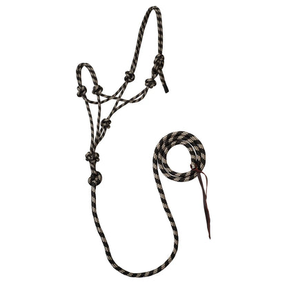 A black and tan braided rope halter with matching lead rope and leather tie, displayed on a clean white background.