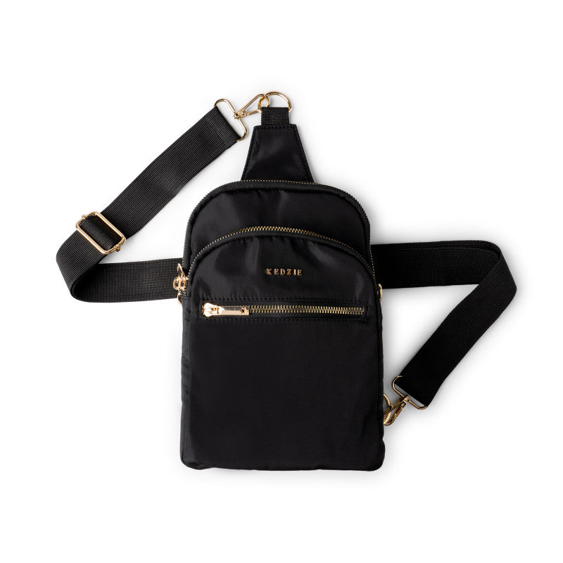Black Kedzie crossbody bag with gold accents on a white background