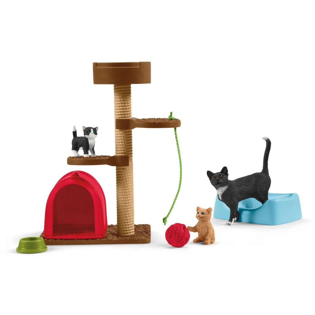 Schleich cat play set with scratching post, toys, and cat figures on a white background