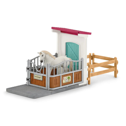 Schleich toy stable with a horse figure on a white background