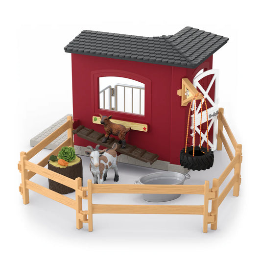 Schleich goat stable set on white background