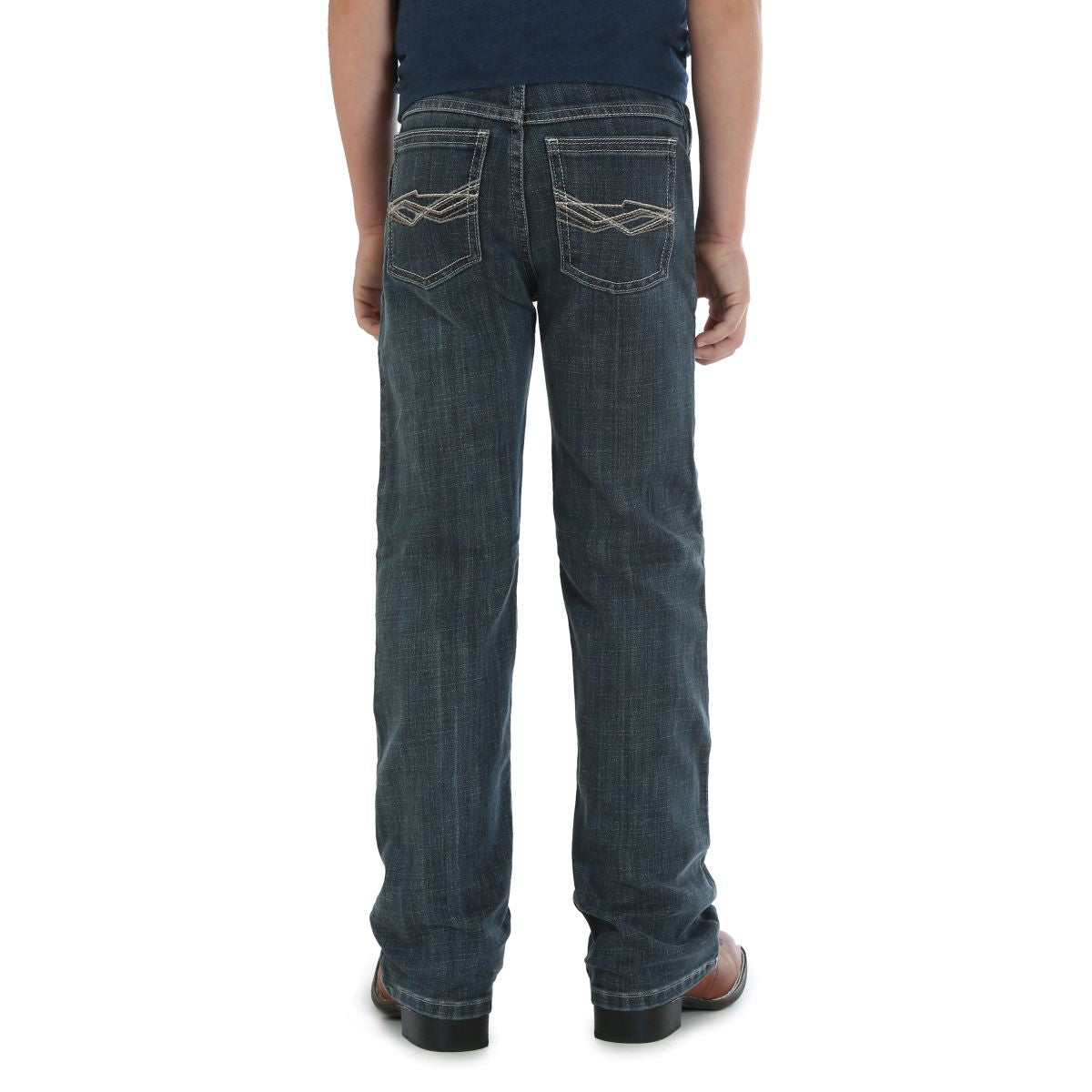 a boy wearing blue jeans and a navy t shirt on a white background