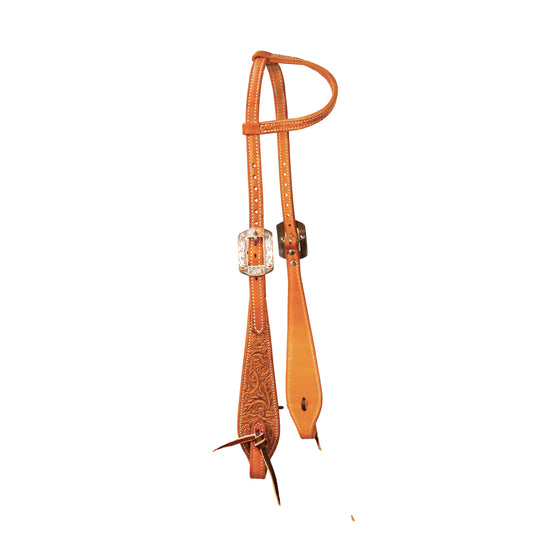 Brown leather bridle with decorated buckles on a white background