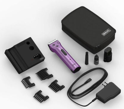 the contents of the arco wahl clipper set including a charge station batteries, attachments and case