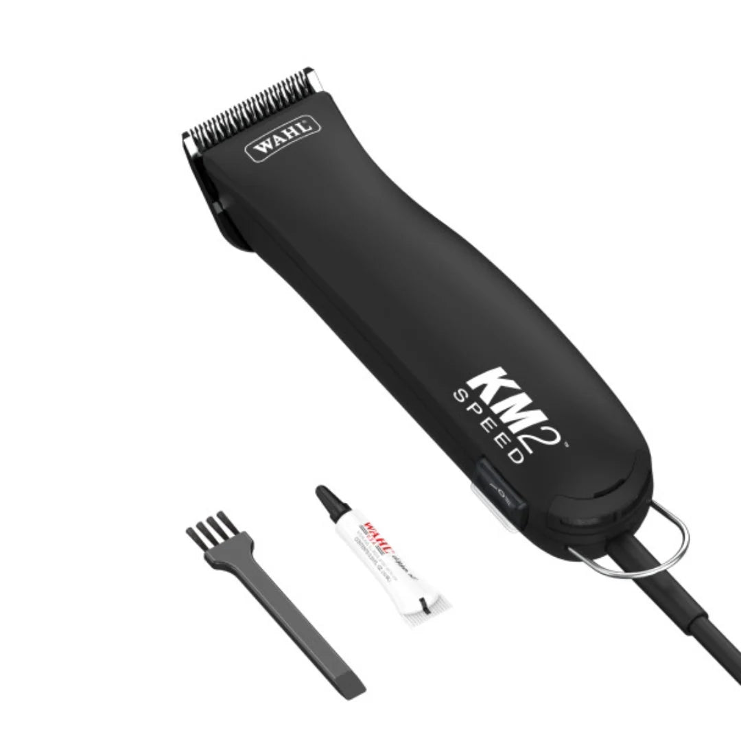 Black hair clipper with accessories on a white background