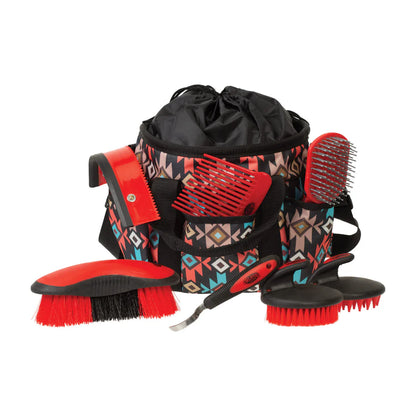 Set of grooming tools including brushes and a bag with a geometric pattern on a white background