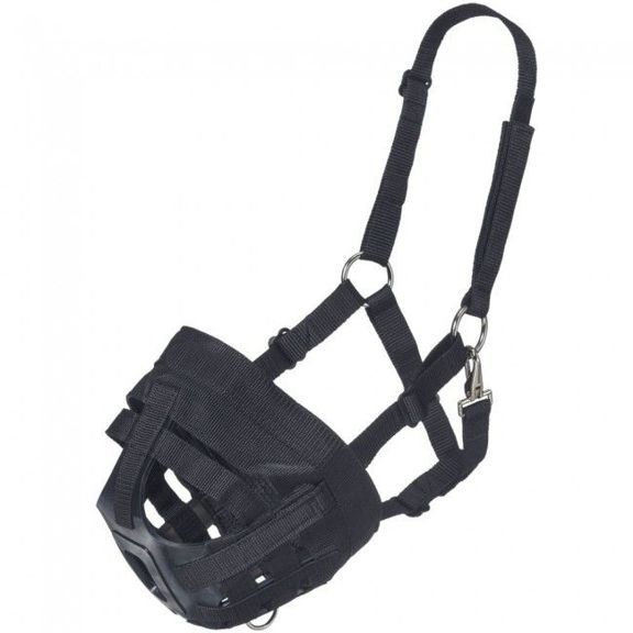 Black muzzle used for horses to limit grazing with a strap on a white background