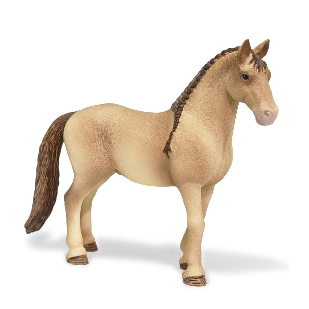 Schleich toy horse figurine on a white background