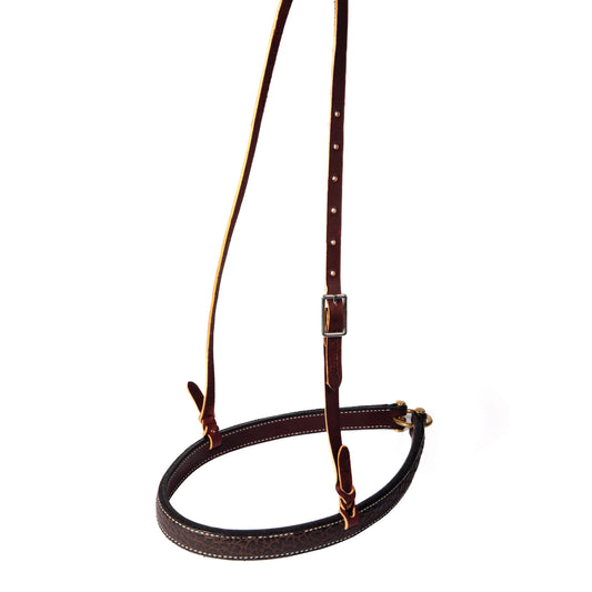 A brown leather nose band with brass hardware, featuring a chocolate bison print.