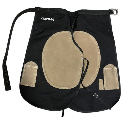 a black farrier apron with tan leather wear patches and pockets