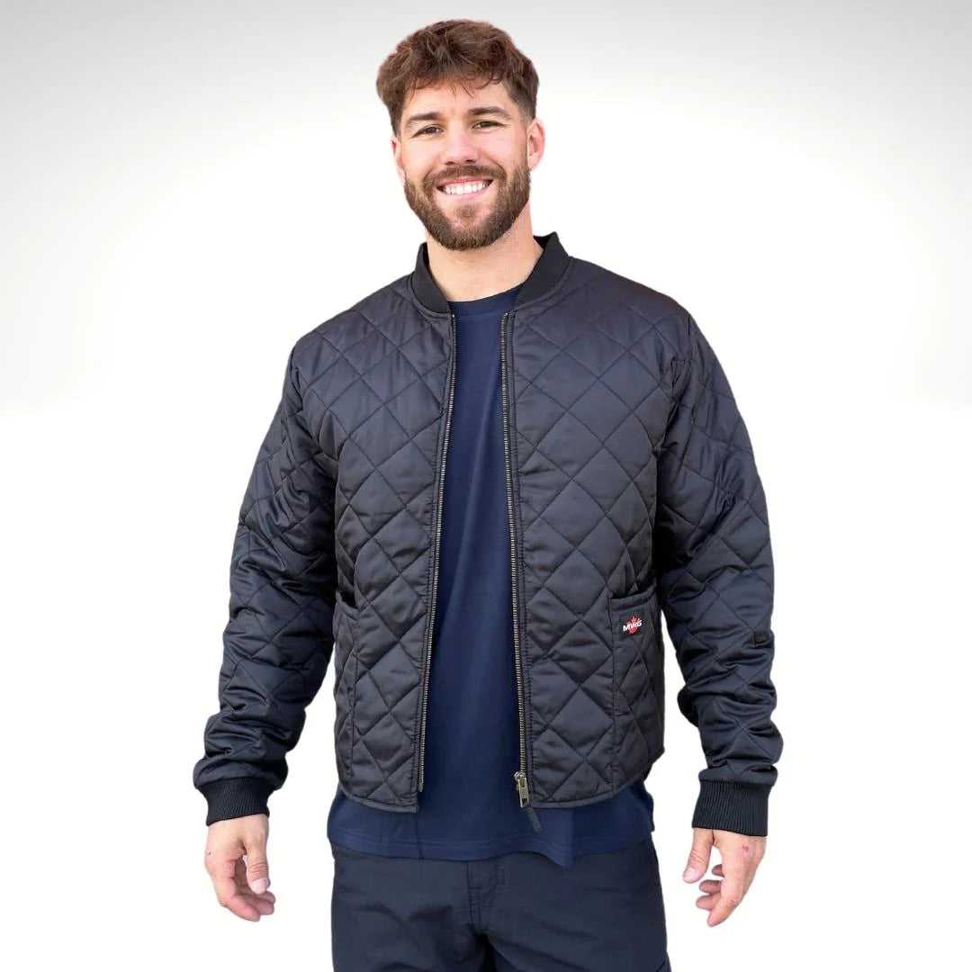 Man wearing a black freezer jacket on a white background