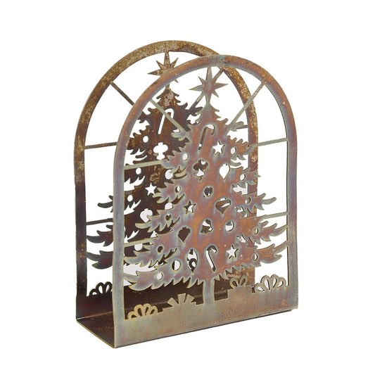 Rustic metal holiday napkin holder from Park Designs featuring a laser-cut Christmas tree silhouette inside an arched frame, finished with a weathered brown and bronze patina on a white background.