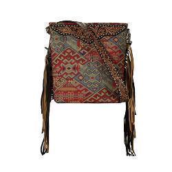 a fringed colorful crossbody purse with leather details on a white background