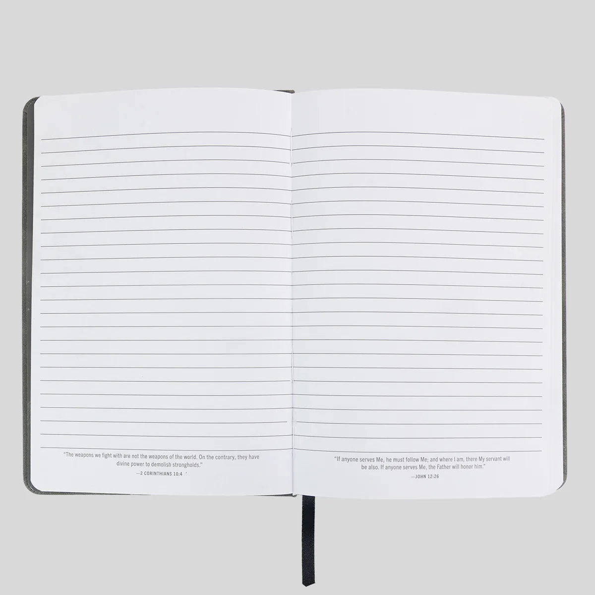 An open lined journal or notebook from Kerusso with black text quotes printed at the bottom of both pages, shown against a light gray background.