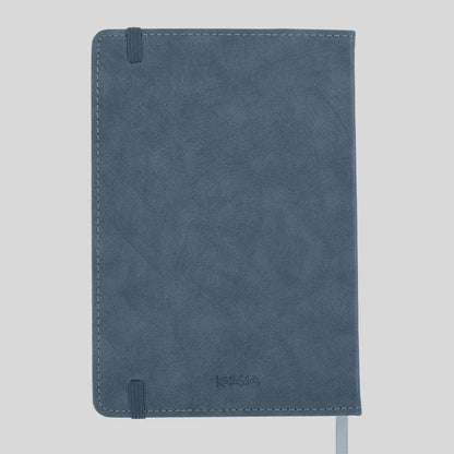 Back of a blue journal from Kerusso