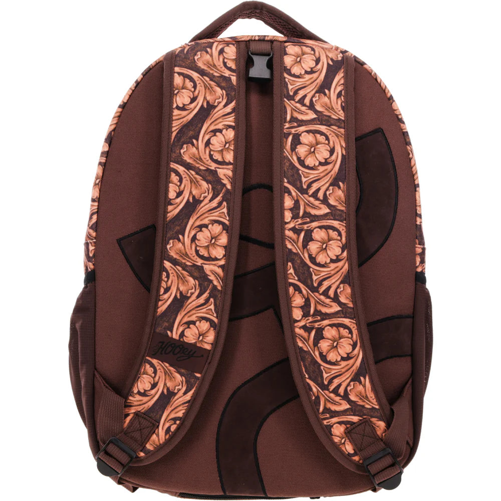 Brown Hooey backpack with floral pattern on straps against a white background