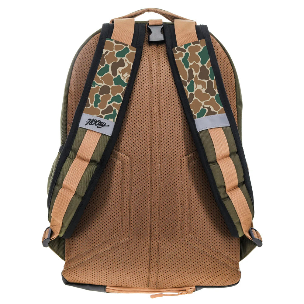 Hooey Backpack with camouflage-patterned straps on a white background
