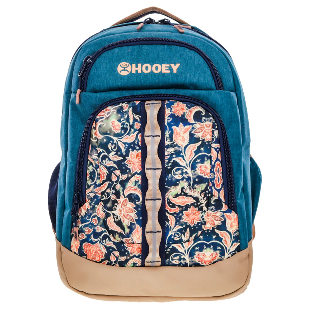 A teal blue HOOEY backpack with a beige bottom base, featuring a front pocket with a navy blue and peach floral pattern