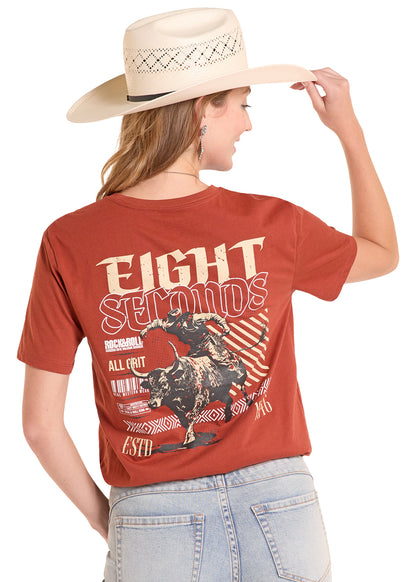 woman wearing a red Rock&Roll Denim tshirt, cowboy hat and blue jeans on a white background