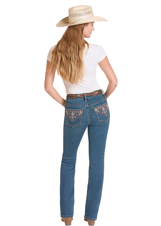 Woman wearing blue Rock&Roll Denim jeans with a decorative patch, white shirt, and beige cowboy hat on a white background